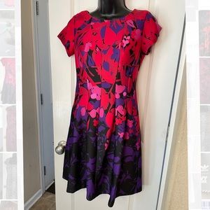 Gently worn once. Db established 1962 Floral dress with Pockets.